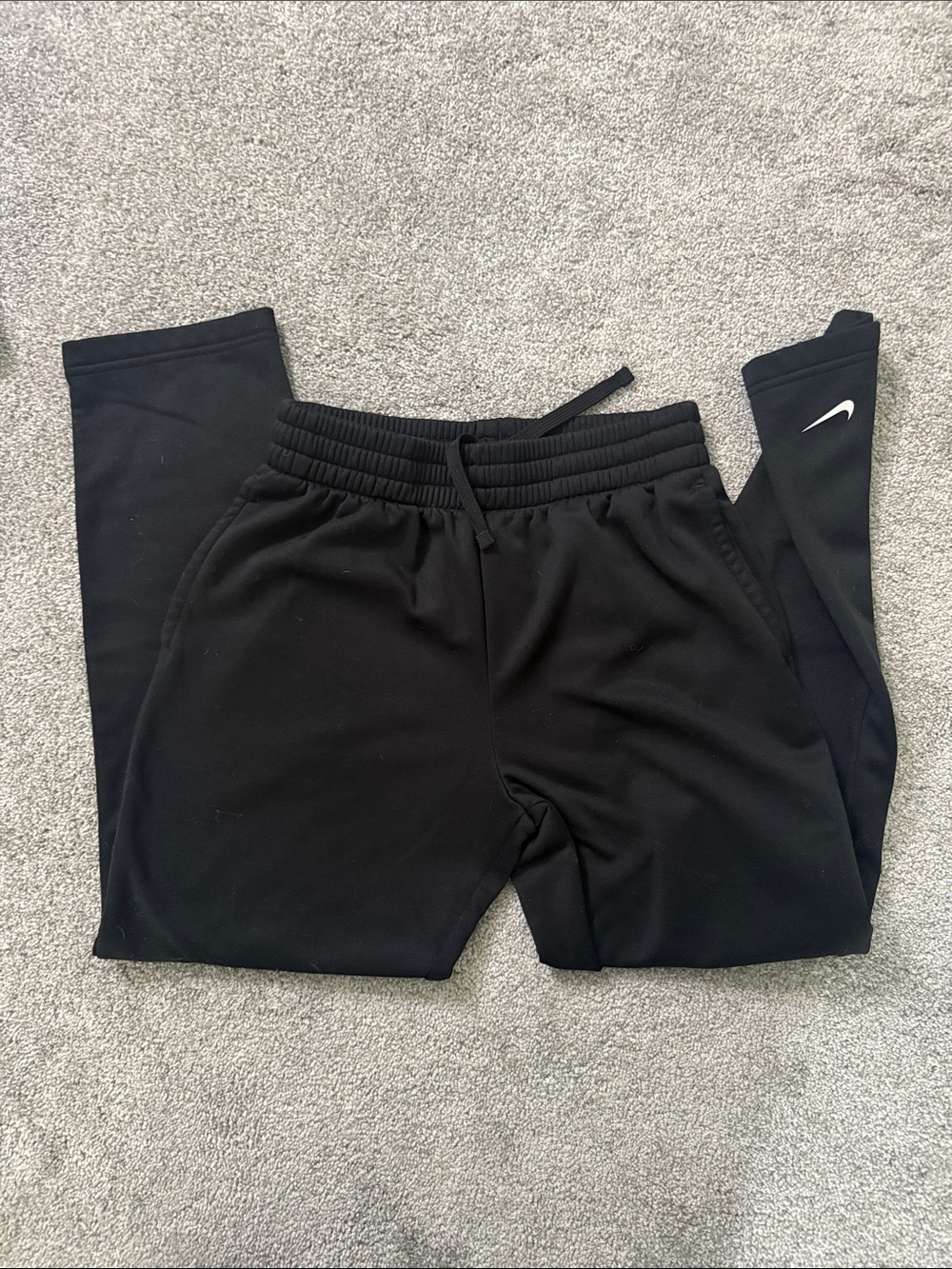 Nike Kids Black Athletic Pants with White Swoosh